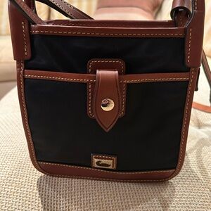 Small Black and Brown Dooney & Bourke Crossbody Bag with brown leather accents